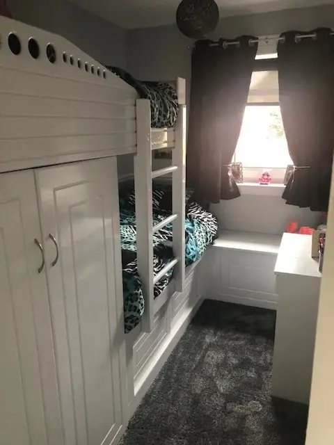 custom made bunk bed with shelves and units