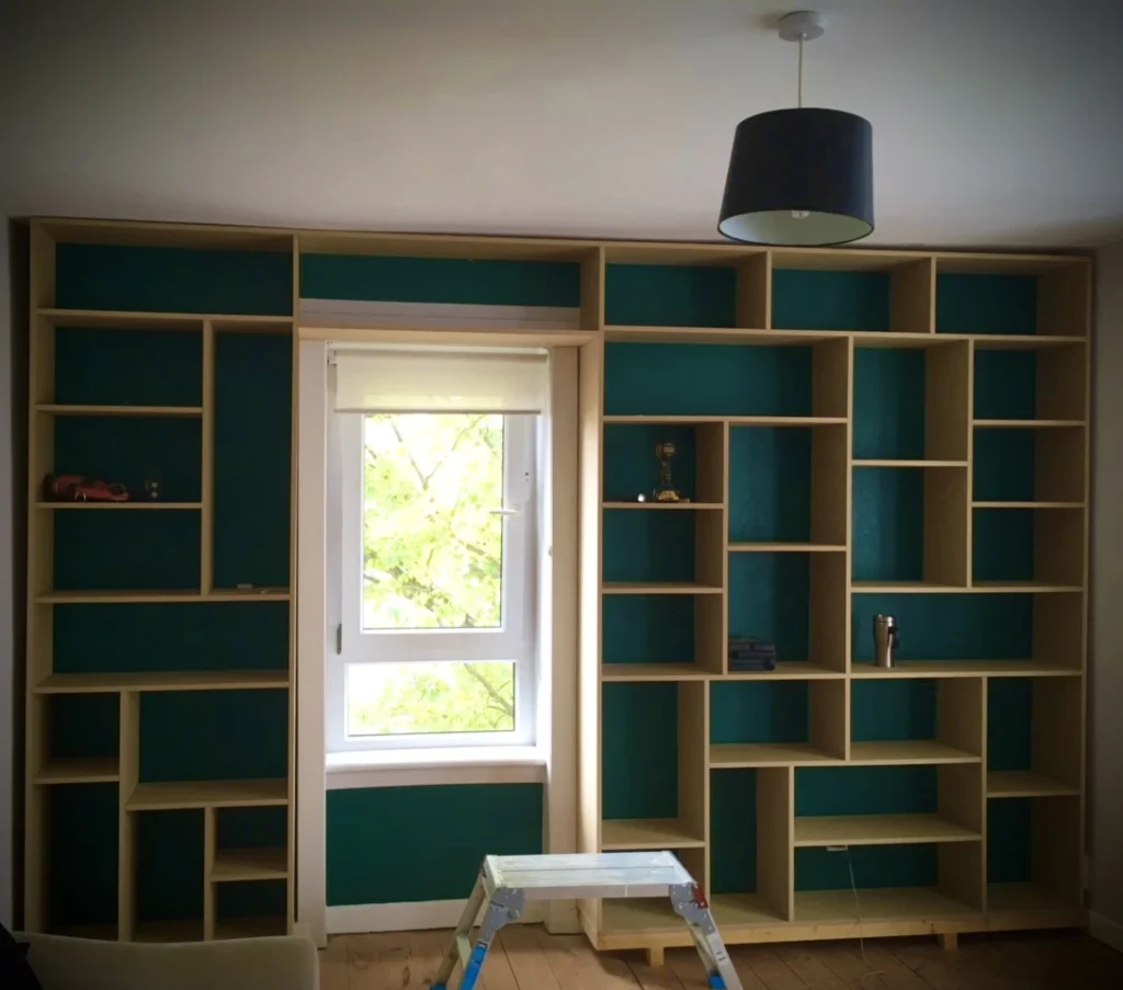 custom wall storage in wood, with painted wall sections